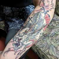 左腕　龍　漢字　タトゥー　刺青